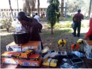 Sun King products laid out at an outdoor sales event